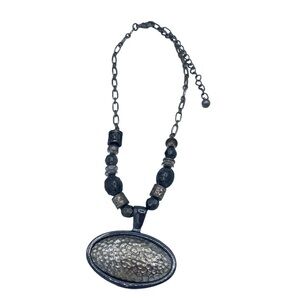 Kenneth Cole necklace with oversized silver tone pendant hammered